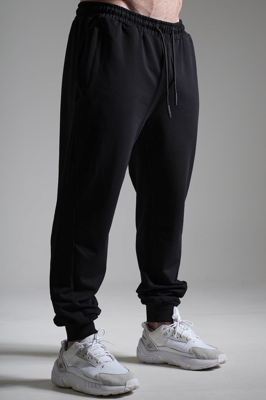 Miesten Basic loose collegehousut musta