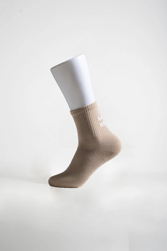 Sukat tekstillä beige