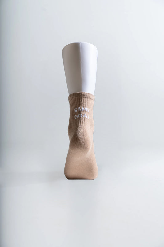 Sukat tekstillä beige